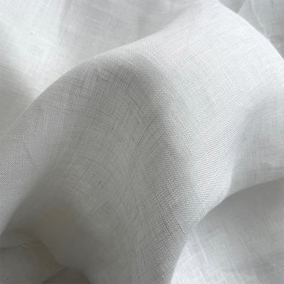 Close-up of white linen lightweight fabric with a classic linen weave - Fabric Collection