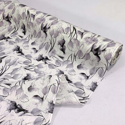 Roll of floral tulip linen fabric design on a white background - Fabric Collection