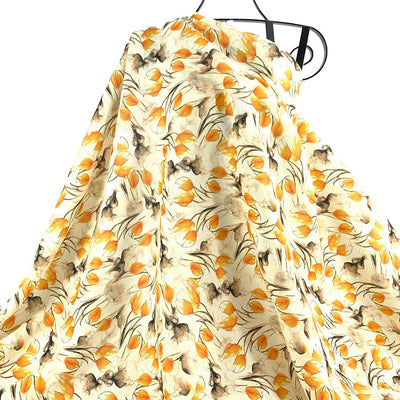 Floral Tulip Bud patterned linen fabric with orange and black flowers on a white background - Fabric Collection