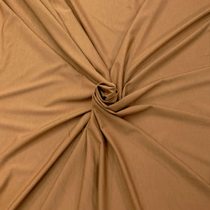 Close-up of bronze brown bamboo knit fabric with a knot - Fabric Collection