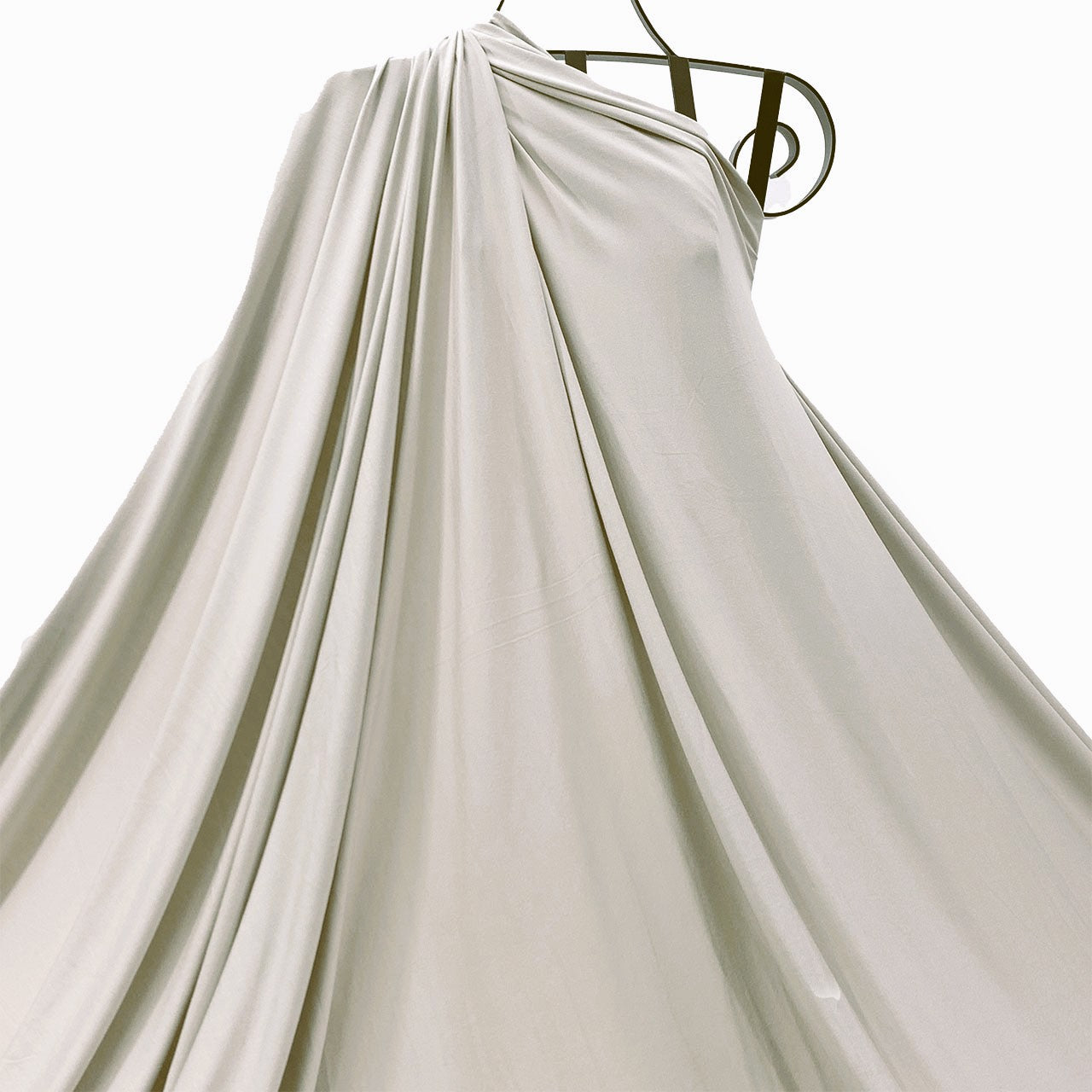 Beige bamboo jersey knit fabric, soft, breathable and eco-friendly draped on mannequin- Fabric Collection