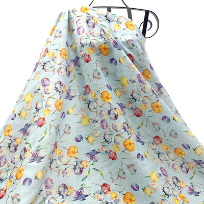 Floral linen fabric with colorful flowers on a light blue background - Fabric Collection