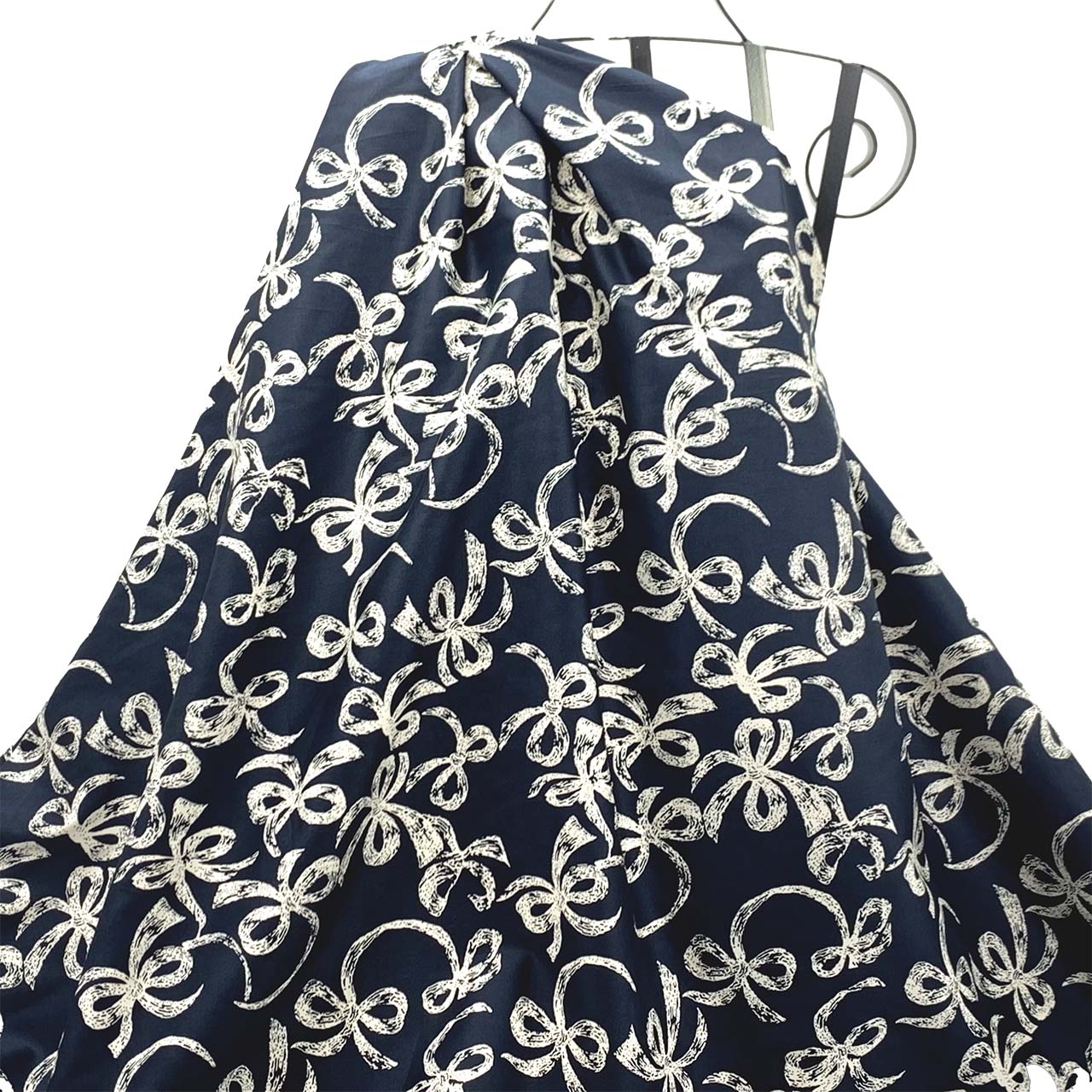 draped cotton sateen navy fabric printed cream bows